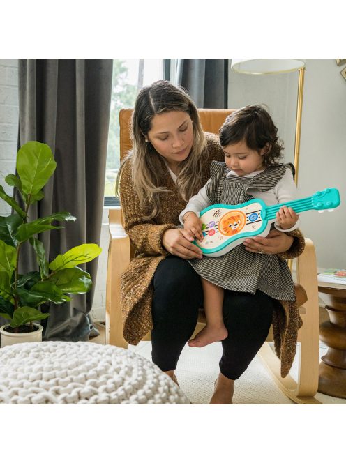 BABY EINSTEIN Zenélő fa játék ukulele Magic Touch HAPE 6hó+