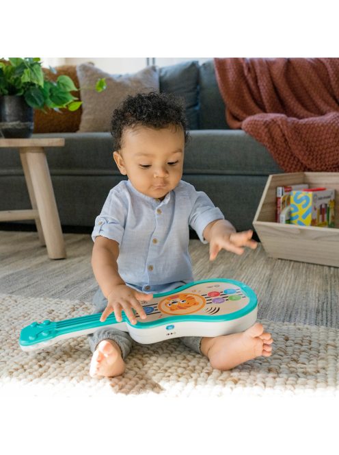 BABY EINSTEIN Zenélő fa játék ukulele Magic Touch HAPE 6hó+