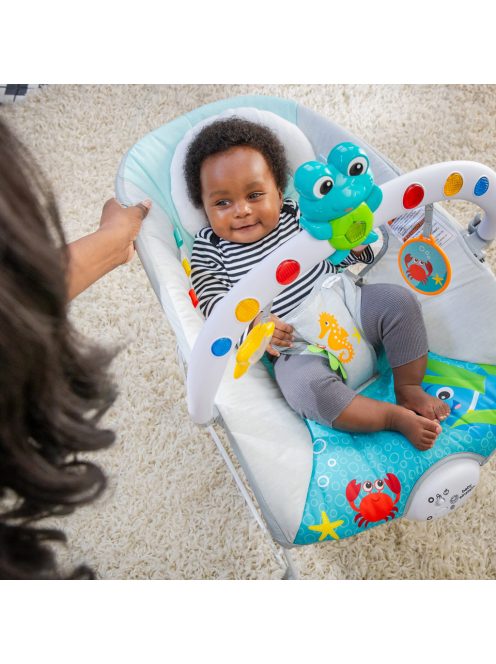 BABY EINSTEIN Zenélő rezgő pihenőszék fényekkel Kick to It Neptune 9 kg-ig