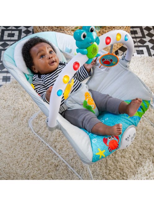 BABY EINSTEIN Zenélő rezgő pihenőszék fényekkel Kick to It Neptune 9 kg-ig